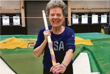  ?? Lisa Rathke / Associated Press ?? Florence “Flo” Filion Meiler, an 84-year-old record-setting pole vaulter shown training at the University of Vermont indoor track in Burlington, Vt., is headed to the world championsh­ips in Poland.