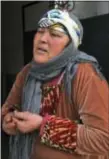  ?? ANIS BEN SALAH - THE ASSOCIATED PRESS ?? Nour El Houda Hassani, the mother of Anis Amri, reacts after the death of her son in Oueslatia, central Tunisia, Friday. Anis Amri, the Tunisian-born suspect in the Berlin truck rampage that killed at least 12, was shot dead early Friday in the...