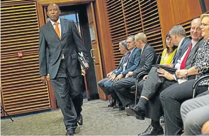  ?? Picture: BLOOMBERG ?? DEADLOCK WAS AVOIDED: Lesetja Kganyago, governor of the Reserve Bank, arrives for a news conference to announce the bank’s decision to raise the repo rate by 25 basis points in Pretoria on Thursday