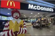  ?? SAKCHAI LALIT — THE ASSOCIATED PRESS ?? People dine at McDonald's at a shopping mall in Bangkok, Thailand, Friday.