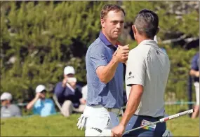  ?? USA Today Sports — Michael Madrid ?? Justin Thomas, left, greets Collin Morikawa during the U.S. Open earlier this month. Thomas and Morikawa will make up half of the U.S. men’s team for the Olympics in Tokyo.