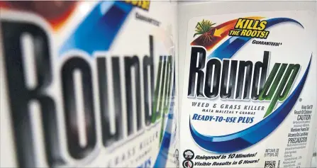  ?? JEFF ROBERSON THE ASSOCIATED PRESS FILE PHOTO ?? Bayer rejects allegation­s Roundup made people ill, arguing there are hundreds of studies that demonstrat­e the compound in the product is safe to use.