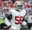  ?? DARRYL WEBB — THE ASSOCIATED PRESS ?? In this Oct. 28, 2018, file photo, the 49ers’ Reuben Foster (56) jogs on the field against the Arizona Cardinals in Glendale, Ariz.