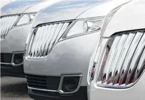  ?? ASSOCIATED PRESS FILE PHOTO ?? A row of Lincoln MKX SUVs are lined up on the lot of the dealership in Wexford, Pa.