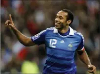  ?? FRANCOIS MORI — THE ASSOCIATED PRESS FILE ?? France’s Captain Thierry Henry celebrates after scoring gainst Austria during their World Cup 2010 qualifying soccer match. Kylian Mbappe and Henry are seemingly linked by destiny. While Henry is France’s leading scorer with 51 goals and among the greatest forwards of the modern era, the 19-year-old Mbappe is the new French sensation tipped to become perhaps even the world’s best.