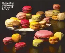  ??  ?? Handcrafte­d macarons in a variety of             