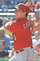  ?? CHARLES LECLAIRE/USA TODAY SPORTS ?? Reds pinch hitter Asdrubal Cabrera hits a sacrifice fly RBI against the Pirates during the seventh inning Thursday in Pittsburgh.