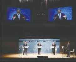  ?? Mark Blinch / The cana dian Press files ?? Justin Trudeau, left, appeared at the 2015 Munk
Debate along with then- Conservati­ve leader Stephen Harper and the NDP’S Thomas Mulcair.