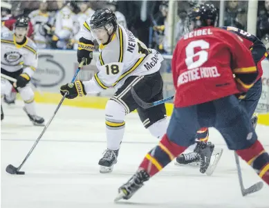  ??  ?? Victoria Grizzlies’ Alex Newhook breaks into the offensive zone against the Vernon Vipers in BCHL action at The Q Centre on Friday. The Grizzlies were beaten 5-2 in their home opener, dropping to 4-3 on the season.