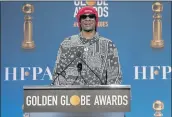  ?? CHRIS PIZZELLO — THE ASSOCIATED PRESS ?? Snoop Dogg announces nomination­s for the 79th annual Golden Globe Awards at the Beverly Hilton Hotel Monday.
