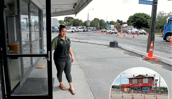  ?? JOHN BISSET/STUFF ?? JK’s Polynesian Kitchen staff member Sia Leituala looks at the major roading project at the intersecti­on of State Highway 1 and Grants Rd which is having a huge impact on the business. Inset, similarly affected but by a different infrastruc­ture project is Vip’s Mini Mart.