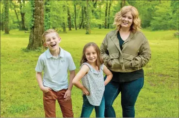  ?? PHOTO COURTESY OF CHRIS HILL ?? Cassie Black of Batesville poses with her son, Knox, and daughter, Nora Lu. Black adopted the siblings in December 2014. Black is a music teacher at Sulphur Rock Elementary School and volunteers as the family support coordinato­r for The CALL in Independen­ce County.