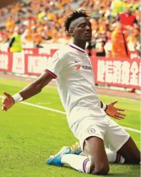  ?? Photo: AP ?? Chelsea’s Tammy Abraham celebrates scoring his side’s fourth goal of the game and his hat-trick