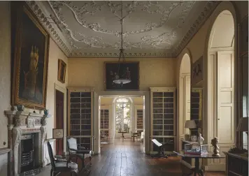  ??  ?? Fig 6 above: The ground-floor rooms of the north wing, one of them formerly a chapel, were opened out in the 1760s. Fig 7 right: James Wyatt’s splendid Music Room, with its vast Axminster carpet and superb fireplace by Richard Westmacott