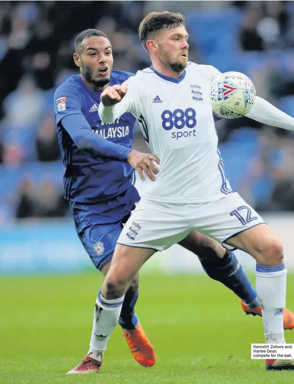  ??  ?? Kenneth Zohore and Harlee Dean compete for the ball.
