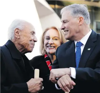  ?? ELAINE THOMPSON/THE ASSOCIATED PRESS ?? Former NBA Seattle SuperSonic­s head coach Lenny Wilkens, Seattle Mayor Jenny Durkan and Washington Gov. Jay Inslee were all smiles Wednesday at the groundbrea­king for a renovated KeyArena, which is key to the NHL expanding to the city in 2021 with the NBA expected to follow.