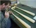  ?? TODD KOROL/TORONTO STAR ?? A finished bat with a stamp that will be used by Miguel Cabrera of the Tigers at Sam Bat. Each bat is carefully inspected for imperfecti­ons before it is shipped out.