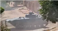  ?? AFP ?? A Sudanese army armoured vehicle is stationed in southern Khartoum. —