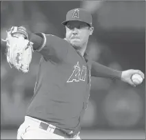  ?? MARCIO JOSE SANCHEZ/AP ?? Angels starting pitcher Tyler Skaggs throws to the Athletics during a June 29 game in Anaheim, Calif. Talks to add testing for opioids began following the death of Skaggs, who was found dead in his hotel room in the Dallas area July 1.
