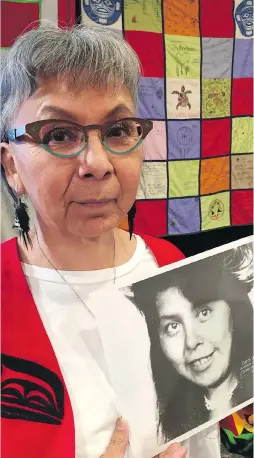  ?? LORI CULBERT ?? Lori Davis, at left, holds a photo of her sister Carol Davis in Richmond, where a community hearing by the national inquiry into missing and murdered Indigenous women and girls was held this week. The inquiry heard testimony about a number of British...