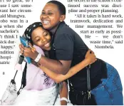  ??  ?? Xolile Ngcobo is congratula­ted in hospital by her sister Zama Khumalo, who brought her her results.