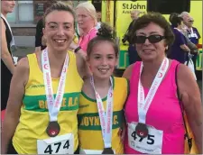  ??  ?? Three generation­s! Edel and Eabha McGabhann and Margaret Durnin after completing the Midsummer 5k.