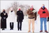  ?? Jarret Liotta for Hearst Connecticu­t Media ?? Town officials take part in a commemorat­ive moment at Spring Grove Veterans Cemetery as part of the Wreaths Across America Day event.