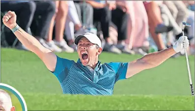  ?? ?? Rory Mcilroy celebrates holing his bunker shot on Augusta’s 18th on Masters Sunday