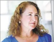  ?? Hearst Connecticu­t Media file photo ?? U.S. Rep. Elizabeth Esty visits with seniors at the Brookfield Senior Center in July.