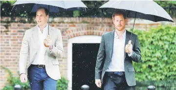  ??  ?? Prince William (left) and Prince Harry visit the White Garden in Kensington Palace in London, Britain last Aug 30. — Reuters file photo