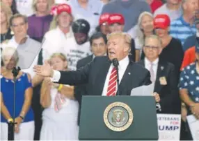  ?? Ralph Freso, Getty Images ?? President Donald Trump leads a rally at the Phoenix Convention Center on Tuesday.