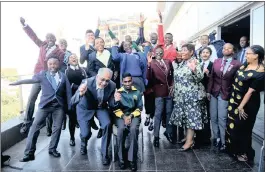  ??  ?? ECSTATIC: Basic Education Minister Angie Motshekga and his deputy Enver Surty with matric high achievers.