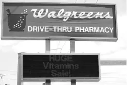  ?? ?? A sign for a Walgreens pharmacy is shown in Bradenton, Florida.