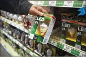  ?? AARON LAVINSKY / MINNEAPOLI­S STAR TRIBUNE ?? The latest data from the National Electrical Manufactur­ers Associatio­n show that over the past three years, the LED bulb’s market share has increased from under 5 percent to 28 percent.