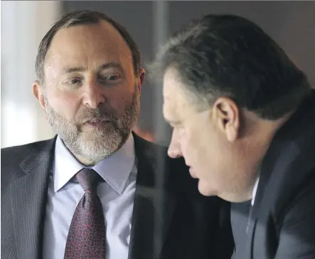  ?? FILES ?? NHL commission­er Gary Bettman, left, with Calgary Flames principal owner Murray Edwards at the Scotiabank Saddledome last year, has said if there isn’t a new rink in Calgary, the club will move. The team is currently at an impasse with the city over...