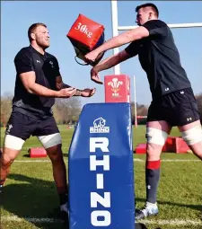  ??  ?? Pass it on: Ross Moriarty and Adam Beard in training