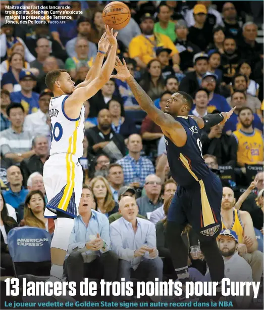  ??  ?? Maître dans l’art des lancers de trois points, Stephen Curry s’exécute malgré la présence de Terrence Jones, des Pelicans.