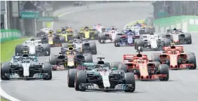  ?? Photo / AP ?? Mercedes driver Lewis Hamilton leads off the line in last year’s Brazilian GP at Sao Paulo.