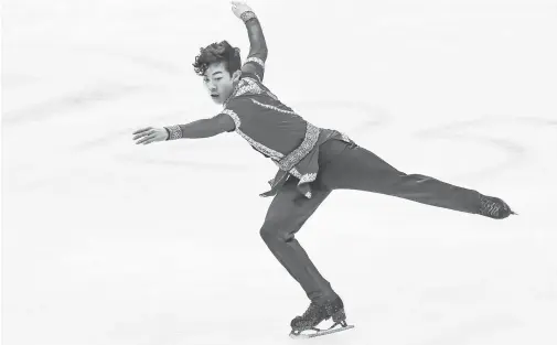  ?? MARKKU OJALA, EPA ?? The USA’s Nathan Chen performs his long program in the world figure skating championsh­ips Saturday.