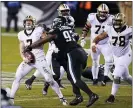  ?? CHRIS SZAGOLA — THE ASSOCIATED PRESS ?? Eagles’ Javon Hargrave (93) sacks Saints quarterbac­k Taysom Hill (7) during action from this season. Hargrave and the defensive line must put pressure on Cowboys quarterbac­k Andy Dalton on Sunday.