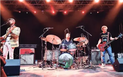  ?? FilmMagic/FilmMagic for Bonnaroo Arts And Music Festival ?? Tom Hamilton, left, Joe Russo, and Dave Dreiwitz of Joe Russo's Almost Dead performs onstage at That Tent during the 2019 Bonnaroo Arts And Music Festival on June 15, 2019, in Manchester, Tenn.