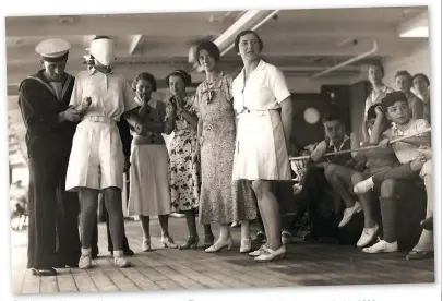  ??  ?? Boredom could be a problem on long sea voyages. These passengers are playing a game on deck in 1936