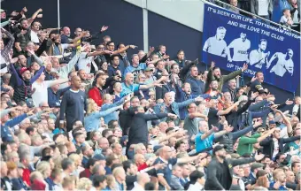  ??  ?? Tottenham fans cheer their team during a match this season.