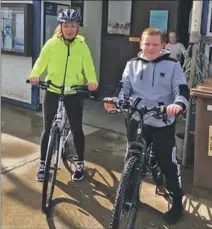  ??  ?? Jamie and his mum Lesley on their bikes.