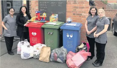  ??  ?? Loughborou­gh’s Dental Suite staff with donations made to Rainbows hospice.