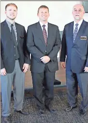  ?? File ?? Chris Miller ( from left), Norman Smith and Steve Miller own Smith and Miller Funeral Home in Cedartown, located on North Main Street in the former Georgia State Patrol barracks.