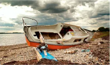  ??  ?? The high cost of disposal often means it is cheaper to abandon old GRP boats