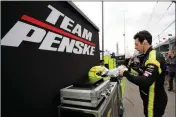  ?? ASSOCIATED PRESS ?? SIMON PAGENAUD, OF FRANCE, prepares to drive before the start of practice Monday for the Indianapol­is 500 auto race at Indianapol­is Motor Speedway in Indianapol­is.