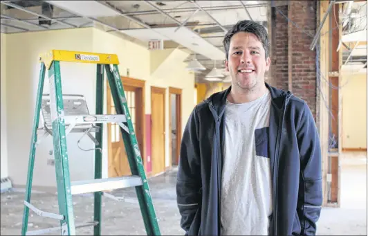  ?? MILLICENT MCKAY/JOURNAL PIONEER ?? Alex Clark, owner of Summerside restaurant Open Eats, recently purchased the old public library building in Summerside. Before it was a library, it was an operating train station. Now Clark is hoping to breathe new life in the old building bringing...