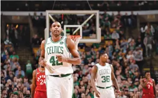  ??  ?? AL HORFORD #42 of the Boston Celtics reacts to a play against the Toronto Raptors on Nov. 12 at the TD Garden in Boston, Massachuse­tts.